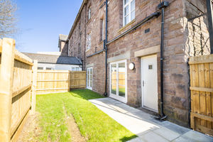 Front elevation and garden - click for photo gallery